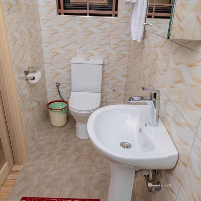 Bathroom with basin, WC and frosted window